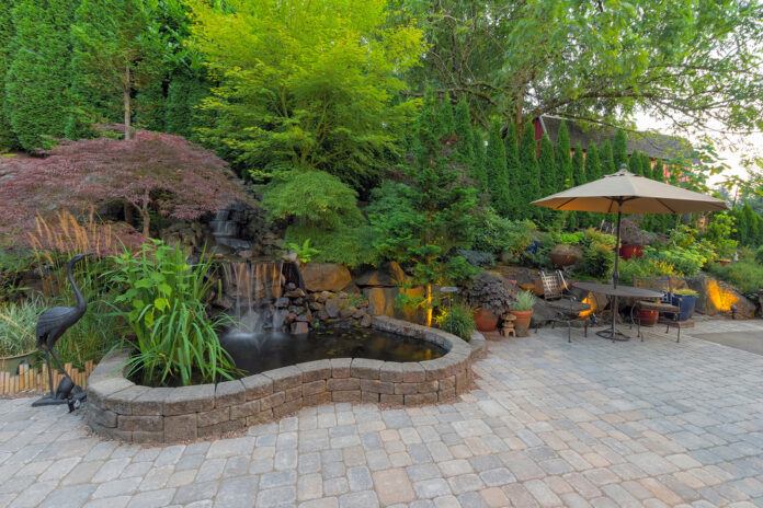 Backyard,Garden,Landscaping,With,Waterfall,Pond,Trees,Plants,Trellis,Decor hardscaping